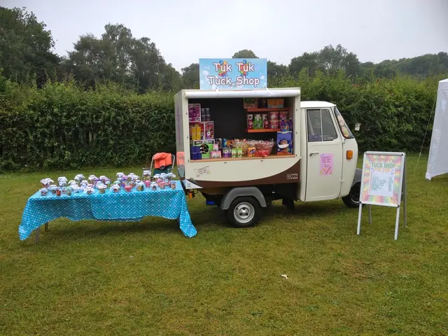 A Piaggio Ape fitted out as a small retail shop counter